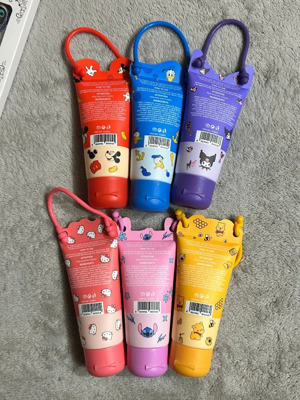 Character Travel Hand Cream Set with Silicone Holders Lot of 6